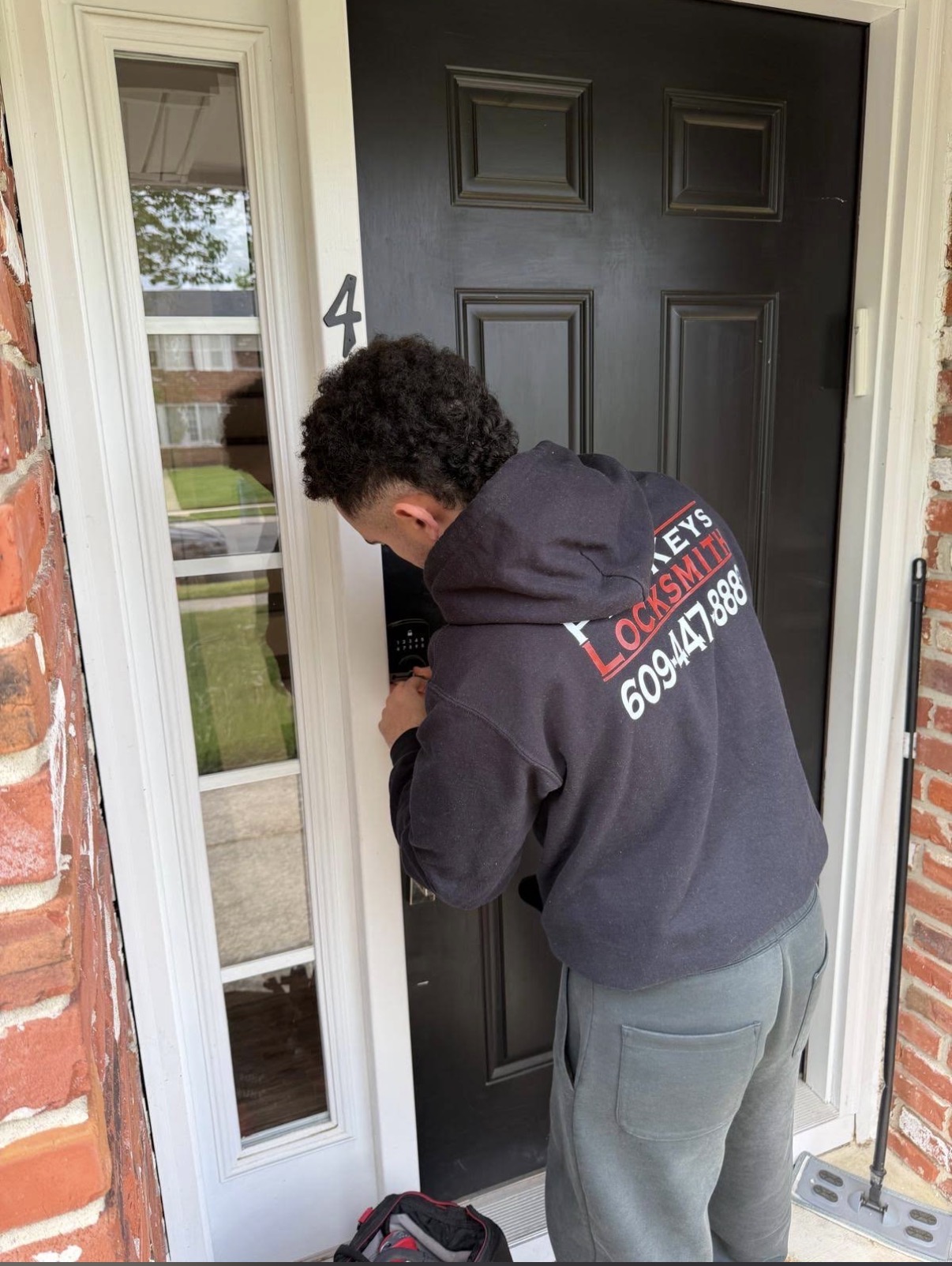 LA Lock Busters technician unlocking car at night in Los Angeles
